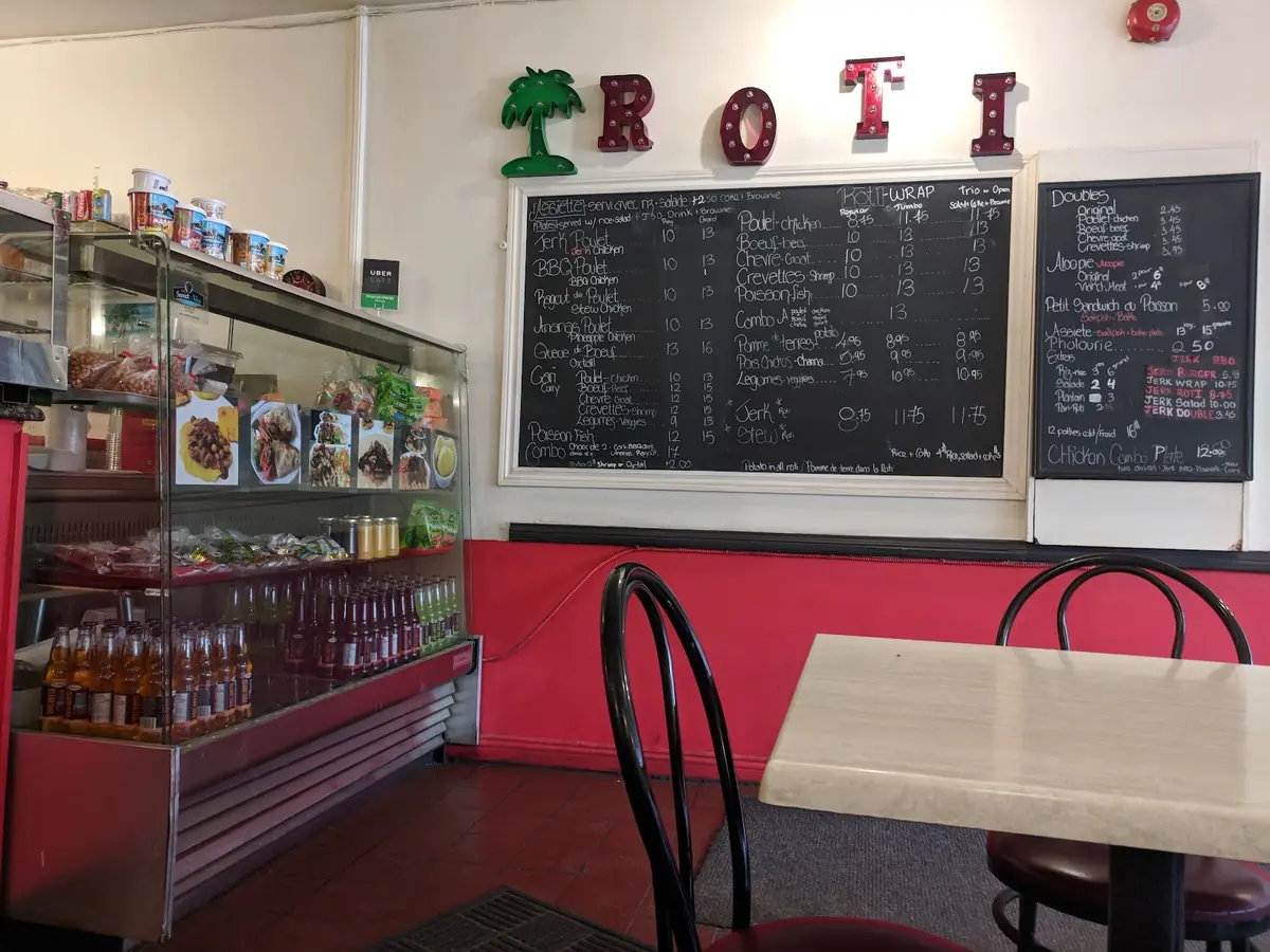 Inside: the roti counter and blackboard menu